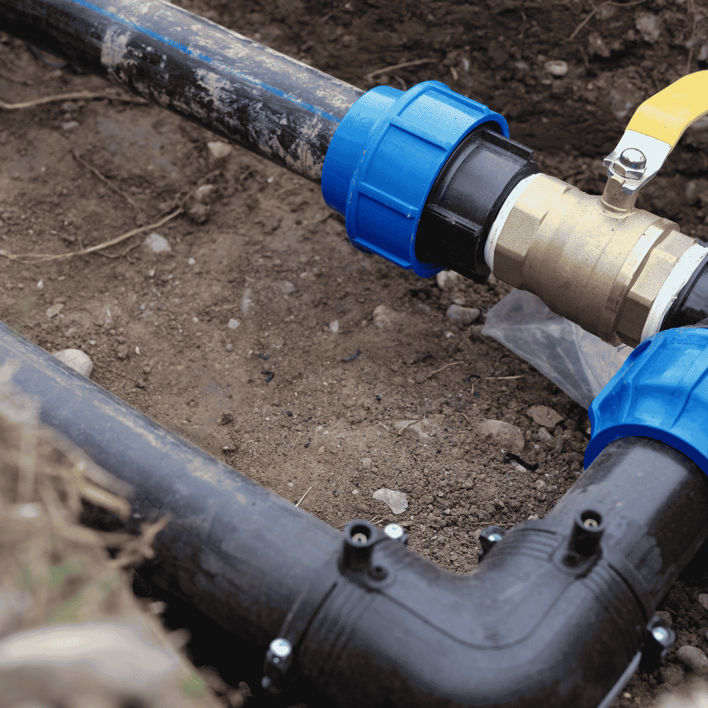 Underground drainage pipework with valve and compression fittings